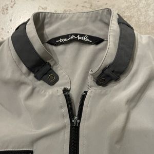 Travis Mathew gray windbreaker jacket